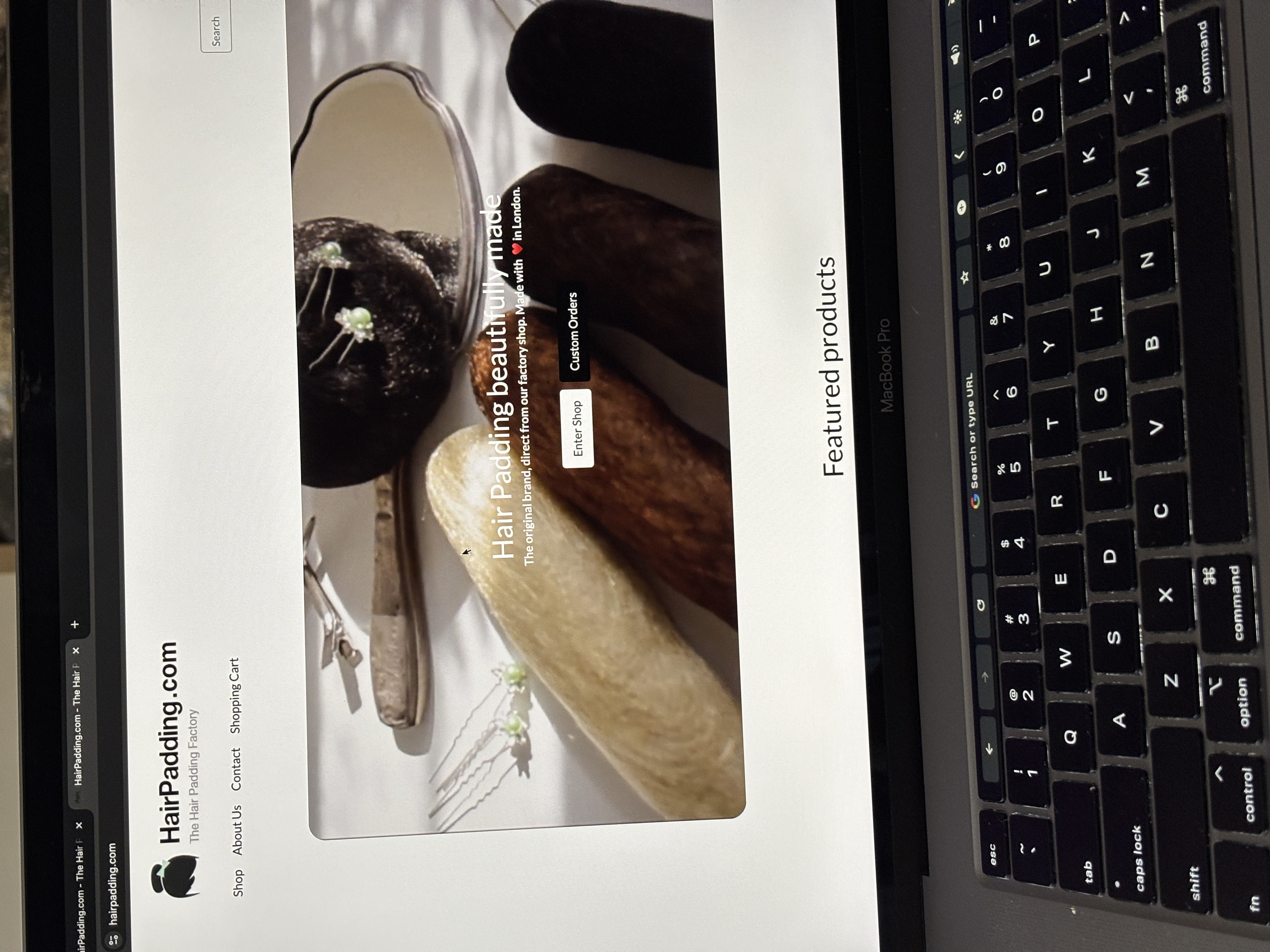 HairPadding homepage hero with product showcase